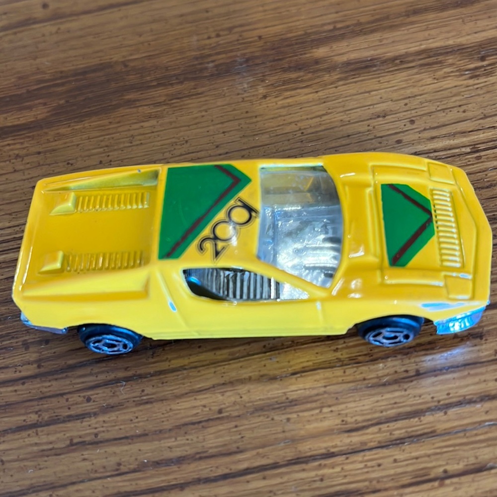 Yellow race car, die-cast metal, 2.50”L
